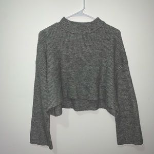 Flared arms sweater